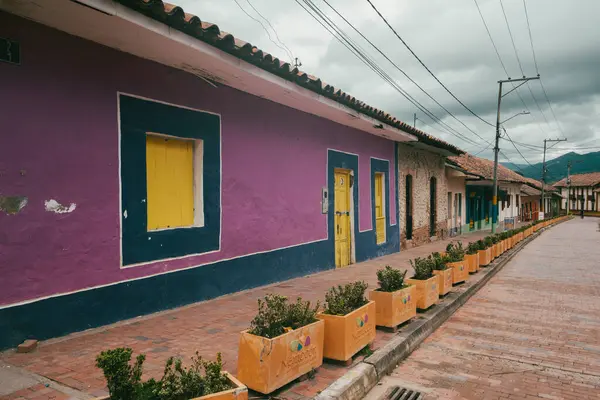 Nemocon, Cundinamarca, Colombia. July 2, 2021: Facade of San Francisco de Ass church and blue sky.