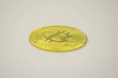 Gold coin Bitcoin on white background. The concept of crypto currency. Blockchain technology. Gold reflect