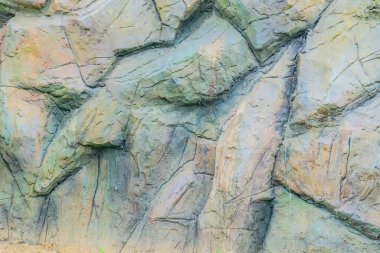 Taş bir duvarın dokusu. Eski kale taşından duvar dokusu. Arka plan ya da doku olarak taş duvar. Bir taş duvarın parçası, arkaplan veya doku için