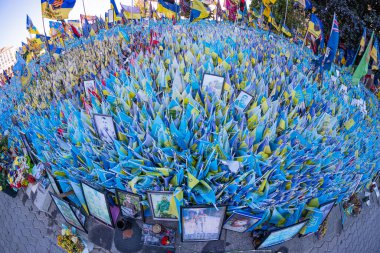 Many Ukrainian flags on the main square Maidan Nezalezhnosti. Memory of the victims of the russian-Ukrainian war Flags of the fallen on Khreshchatyk street. Kyiv, Ukraine. 08-05-2023 clipart