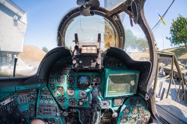 Helicopter cockpit and instrument panel Mi-24 large gunship and attack helicopter at the museum. Soviet military helicopter Mi-24 at National Museum of Ukraine. Kyiv, Ukraine 10-29-2024. clipart