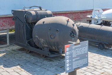 A Ukrainian sea mine. Warships have deployed these bombs in the ocean to protect maritime borders. The old mine is floating above the water, designed for naval blockades. Ukraine 10-29-2024. clipart