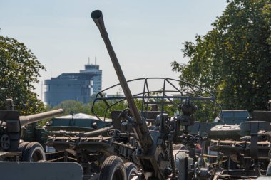 Artillery guns for Ukraine. Part of the exposition of Ukrainian arms. Russian-Ukrainian war. Kyiv, Ukraine 10-29-2024. clipart