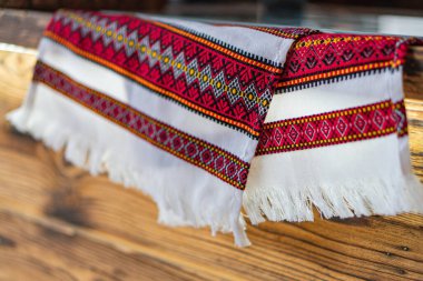 This image depicts a traditional Ukrainian towel rushnykrushnik with intricate geometric patterns, symbolizing good fortune and protection The towel, featuring colors ass Kyiv, Ukraine 03-01-2025