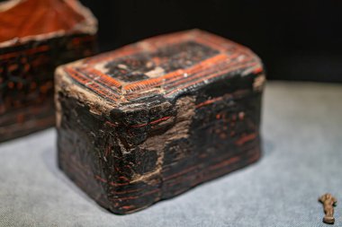 An ancient, worn container with a dark patina and compartments, possibly of Ukrainian, Crimean, ancient Greek, or Scythian origin Could have been used for storage of valuabl Kyiv, Ukraine 03-01-2025 clipart