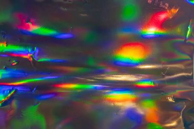 Soyut bir resim, merkezden yayılan enerjik, kaleydoskopik renkler sergiliyor. Enerji, çeşitlilik, yaratıcılık ve markalaşmaya uygun pozitiflik, yenilikçiliği vurgulamaya uygun.,