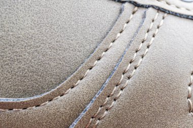 Yüksek kaliteli deri eşyaların yakın çekimi, gösterişli yumuşak, pürüzsüz doku ve dikişler kaliteli moda aksesuarları markası, dayanıklılık, tarz, lüks, detaylara dikkat.