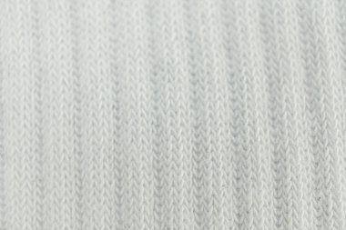 Çapraz dokuması olan dokulu kumaşın yakın plan görüntüsü, promosyon malzemelerindeki giysi örtüsünü görselleştirmek için ideal