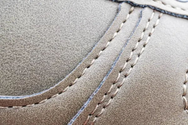 Yüksek kaliteli deri eşyaların yakın çekimi, gösterişli yumuşak, pürüzsüz doku ve dikişler kaliteli moda aksesuarları markası, dayanıklılık, tarz, lüks, detaylara dikkat.