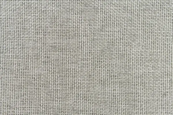 Moda, iç tasarım ve tekstil üretimi gibi çeşitli uygulamalar için uygun, pürüzsüz desenli ince dokunmuş bir kumaşın yakın plan görüntüsü