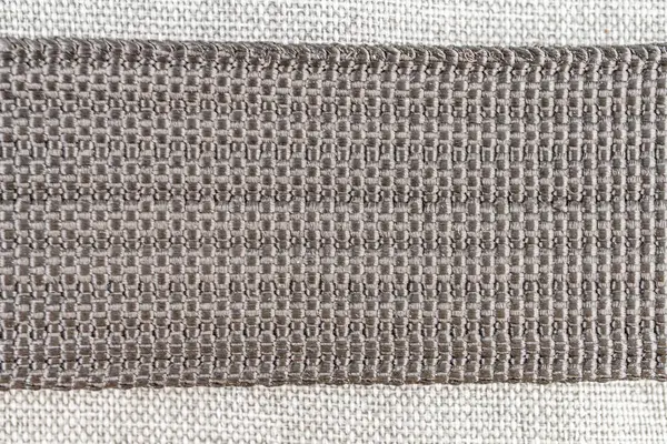 Karmaşık desenli nakışlı kumaşın yakın plan görüntüsü