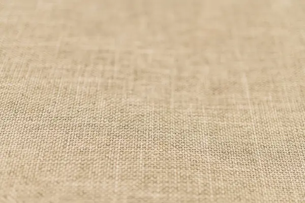 Doğal malzeme ve zanaat temaları pazarlamak için pürüzsüz, el yapımı keten kumaş yakın plan