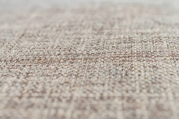 İç tasarım ya da markalaşma için sıcak, desenli kahverengi kumaşın yakın plan görüntüsü