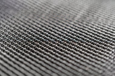 Moda, aksesuarlar, döşemeler veya iç tekstil gibi çeşitli uygulamalarda kullanılan yüksek çözünürlüklü, dokulu, muhtemelen ipek, titiz tasarım ve dokuma ürünü.