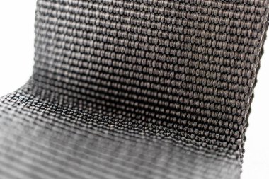 Modern, desenli kumaş görüntüsü, yüksek detay düzeyinde ve nötr toprak renk paleti, bal peteğine ya da doğal yapılara benziyor yüksek kalite ve dayanıklı, mobilya tasarımı ya da