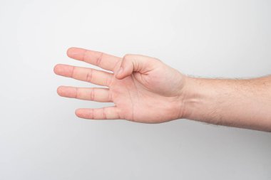 Açık tenli, kıvrık elli, hafif kol kılı görünen, tanımlanamayan arka plan, mesaj yok, düz fotoğraf tarzı.