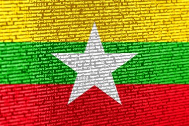 Teknik arkaplanda Myanmar bayrağı olan dijital bir kavram. Myanmar siber güvenlik, programlama ve dijital egemenlik bağlamında. Myanmar 'da site geliştirmenin sembolik görüntüsü.