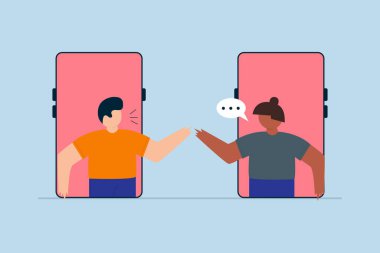 Uzaktan kumandalı teknoloji kullanan insanlar, erkek ve kadın takım arkadaşları akıllı telefon ya da cep telefonu kullanarak buluşmaya çalışıyorlar..