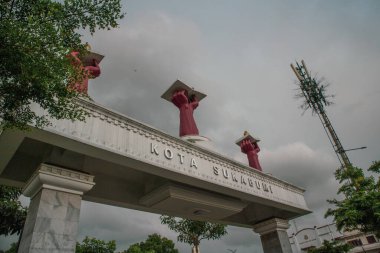 Sukabumi, Indonesia - January 14th 2024 : Sukabumi City Square or Alun- Alun Kota Sukabumi  in the afternoon clipart