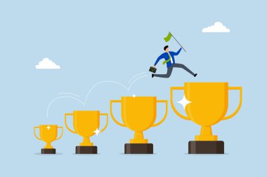 Daha büyük bir hedefe ulaşmak için motivasyona ulaşma başarısı, iş adamının küçük galibiyet kupasından daha büyük bir kupaya atlaması.