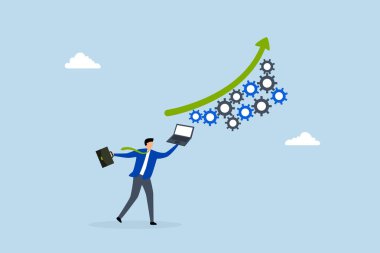 Artan verimlilik, iş adamı verimliliği artırmak için dizüstü bilgisayarla çalışıyor.