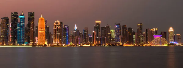 stock image Doha, Qatar- December 23,2019 : Night view of Skyline, Doha's Financial District (West Bay).