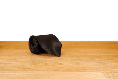 Yuvarlanmış siyah kravat yakın çekim tek bir nesne 