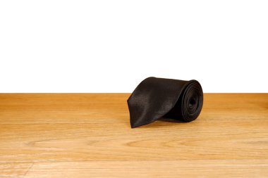 Yuvarlanmış siyah kravat yakın çekim tek bir nesne 