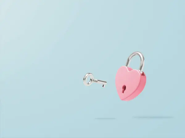 Heart Shaped Pink Padlock Flying Key Pastel Blue Background Minimal — Stock Photo, Image