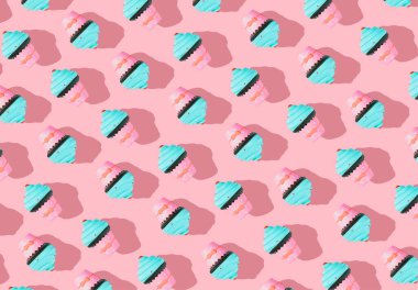 Pastel pembe arka planda renkli dondurma deseni. Yaratıcı asgari yaz yatışı.