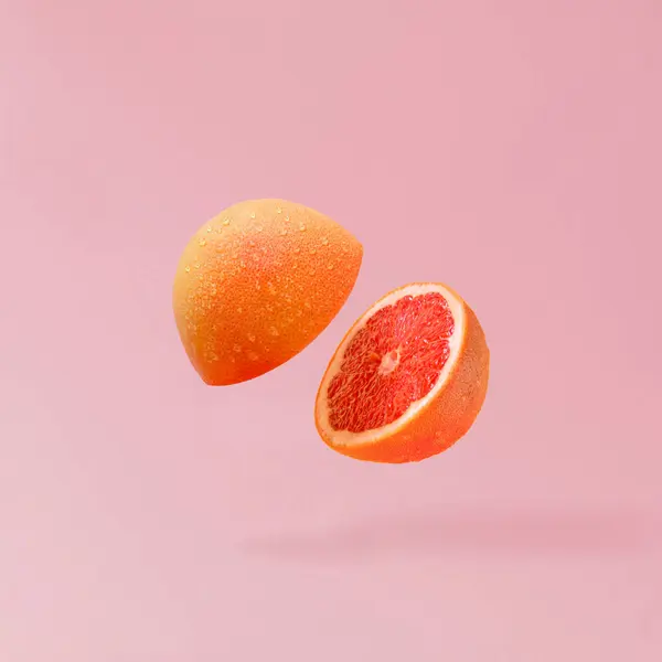 Summer Fruit Composition Made Grapefruit Sliced Half Flying Pastel Pink — Stock Photo, Image