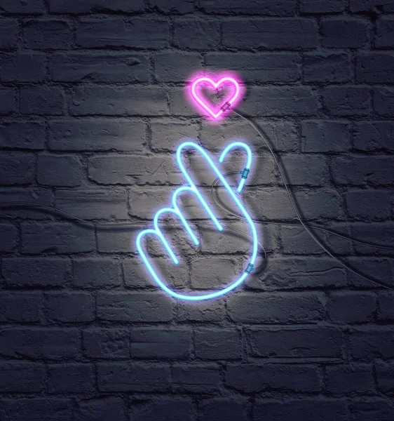 Düz morötesi neon renklerin bileşimi yatıyor.Retro Neon K-POP işareti. Tuğla duvarda izole edilmiş renkli neon ışıklı parmak kalbi işareti. Asgari sevgi kavramı. Yaratıcı sanat, minimal estetik.