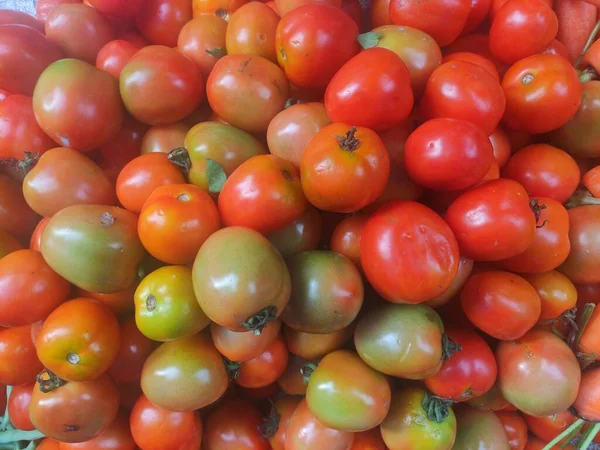 close up of fresh tomatoes at the fruit shop, local fresh fruit. tomato.
