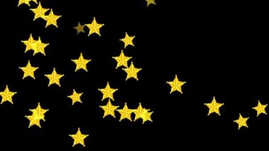 Siyah ekranda uçan sarı yıldızlar.