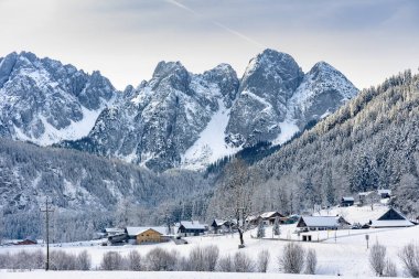 beautiful panoramic snowy winter landscape with Dachstein mountins in Gosau .