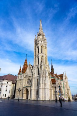 Beautiful Matyas templom Matthias church in Buda castle Budapest with blue sky .