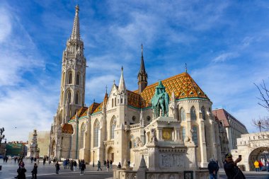 Budapest, Hungary - 01.23.2023: Beautiful Matyas templom Matthias church in Buda castle Budapest with blue sky .