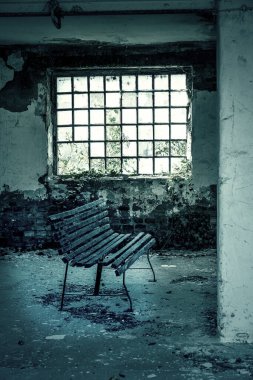 abandoned hunted building window with a bench . clipart