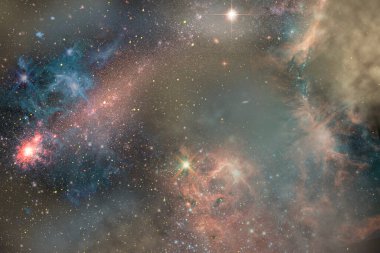 Yıldız tozu arka planına sahip yıldızlı renkli evren .