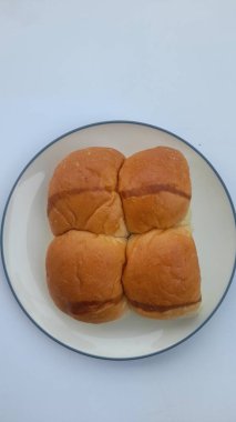 Pastane yemekleri beyaz arka planda üst tabakta. sağlıklı gıda geçmişi konsepti, yemek tarifi, pasta, ekmek, pasta, aperatif, aşçılık, kahvaltı, kafe, öğle yemeği, yemek, karbonhidrat