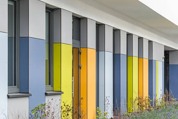 stock image Colorful facade of the object, building. Material of vertical panels. 