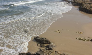cold, empty beach in the Cantabria sea, in Galicia