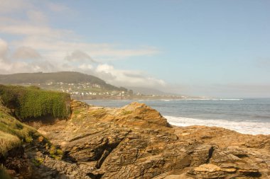 misty day in the Cantabrian sea seen from the rocks