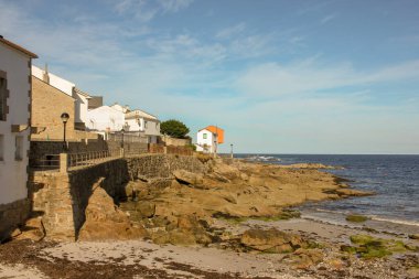 walking in the tiny streets of San Cibrao in the Cantabrian coast