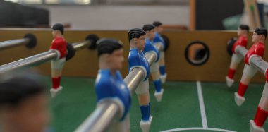 table football blue team is ready to play against the red team