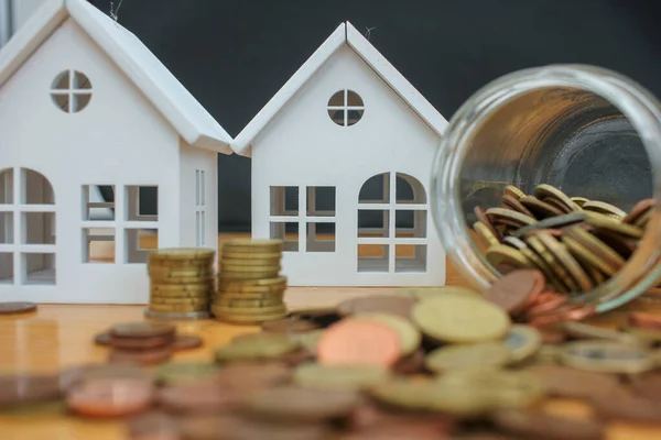 euro coins and houses to buy in times of crisis