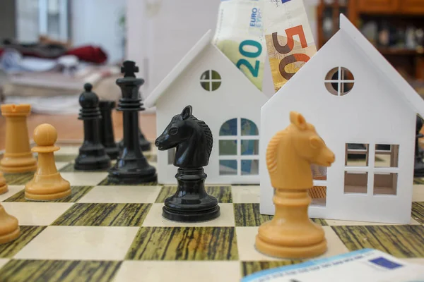 Euro Notes Tiny Houses Made Wood Chess Pieces How Invest — Stock Photo, Image