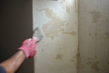 Yüzey hazır: Eldiven Elle Kazıma Duvarı Boyacının Spatula 'sı