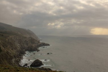 cliffs and sea in Estaca de Bares, Spain clipart