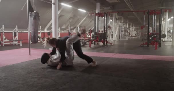 Handheld Shot Diverse Women Gis Wrestling Floor Grappling Training Spacious — Videoclip de stoc